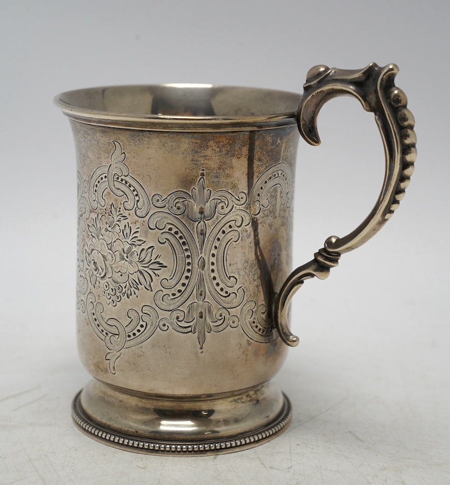 A Victorian engraved silver christening mug, by Edward Charles Brown, London, 1872, 11cm, 5.4oz. Condition - fair to good